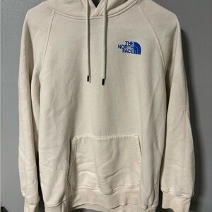 The North Face Off-White Hoodie with Blue Logo